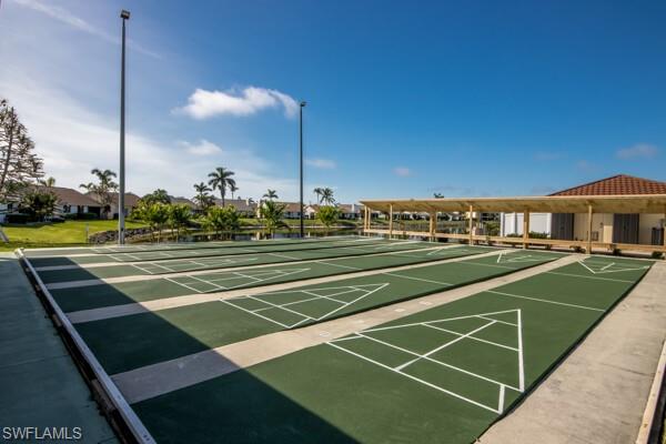 11110 Caravel Circle, Unit 205 Fort Myers, FL 33908 - Photo 30 of 45 a view of an outdoor space and tennis court
