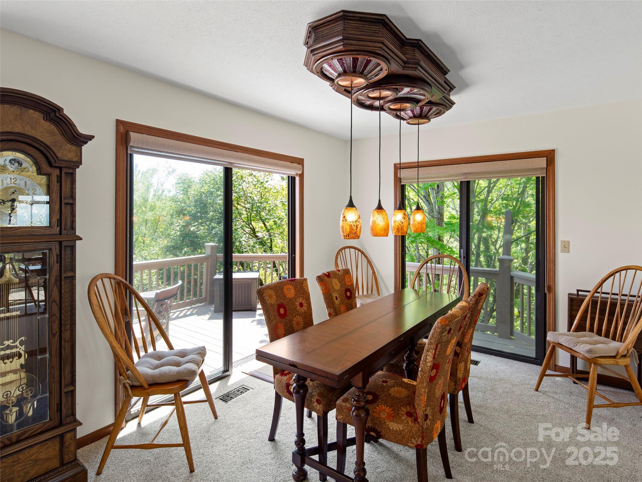 167 Country Ridge Road Laurel Park, NC 28739 - Photo 11 of 27 a view of a dining room with furniture window and outside view