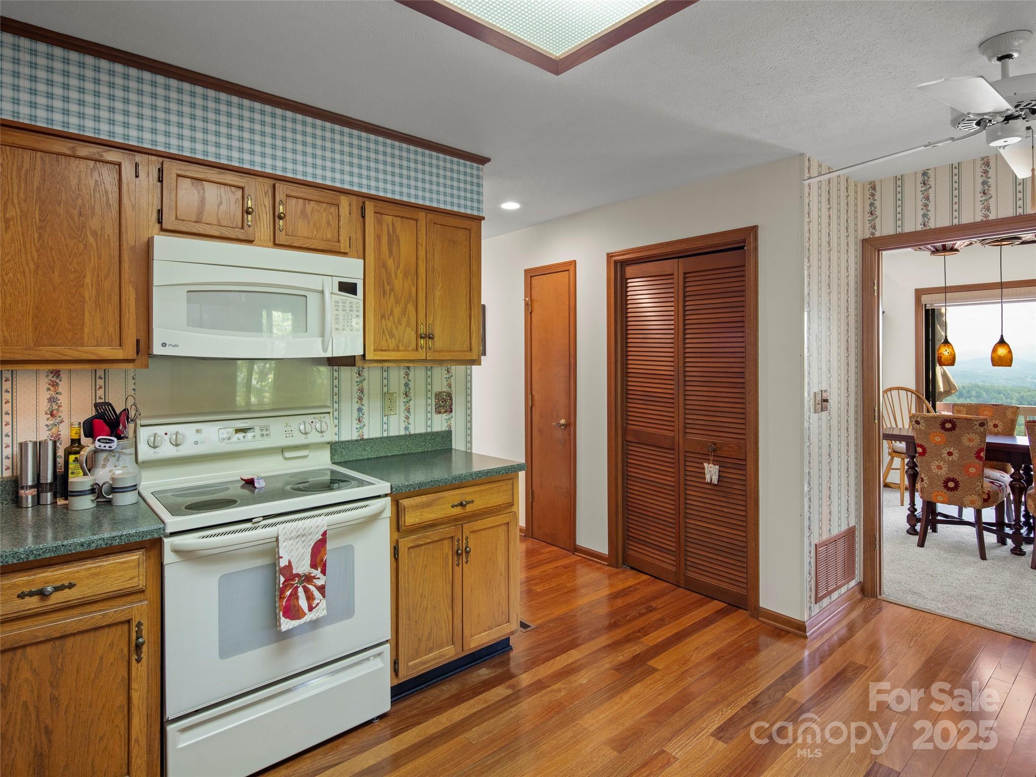 167 Country Ridge Road Laurel Park, NC 28739 - Photo 18 of 27 a kitchen with a sink and cabinets