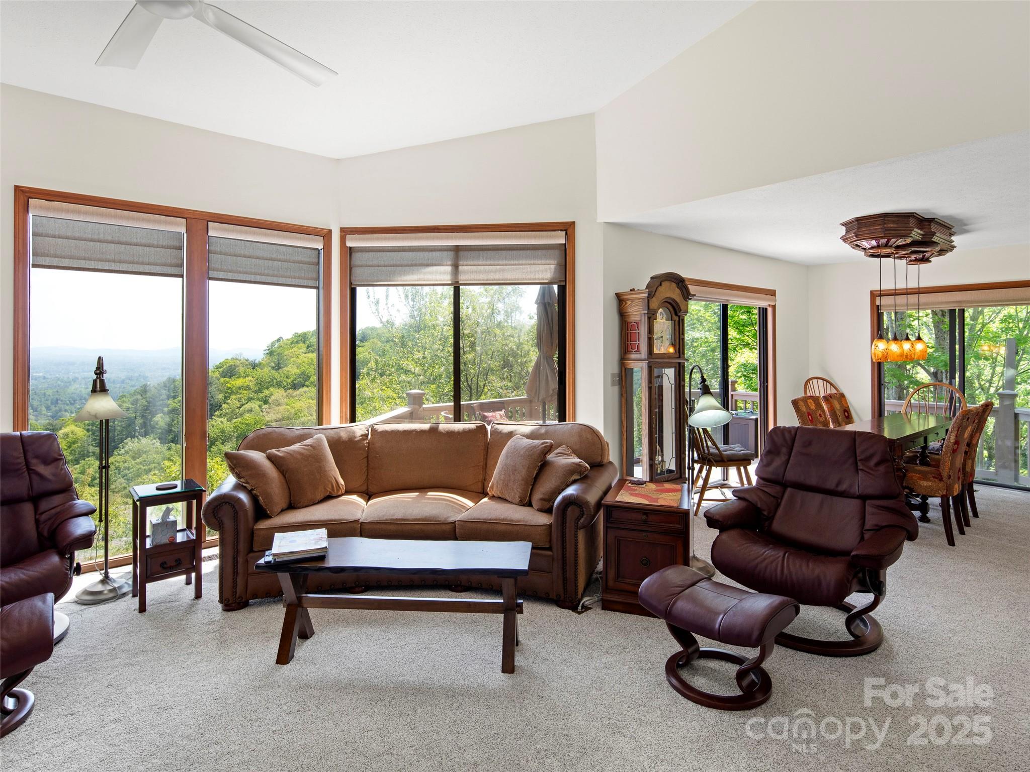 167 Country Ridge Road Laurel Park, NC 28739 - Photo 2 of 27 a living room with furniture and a large window