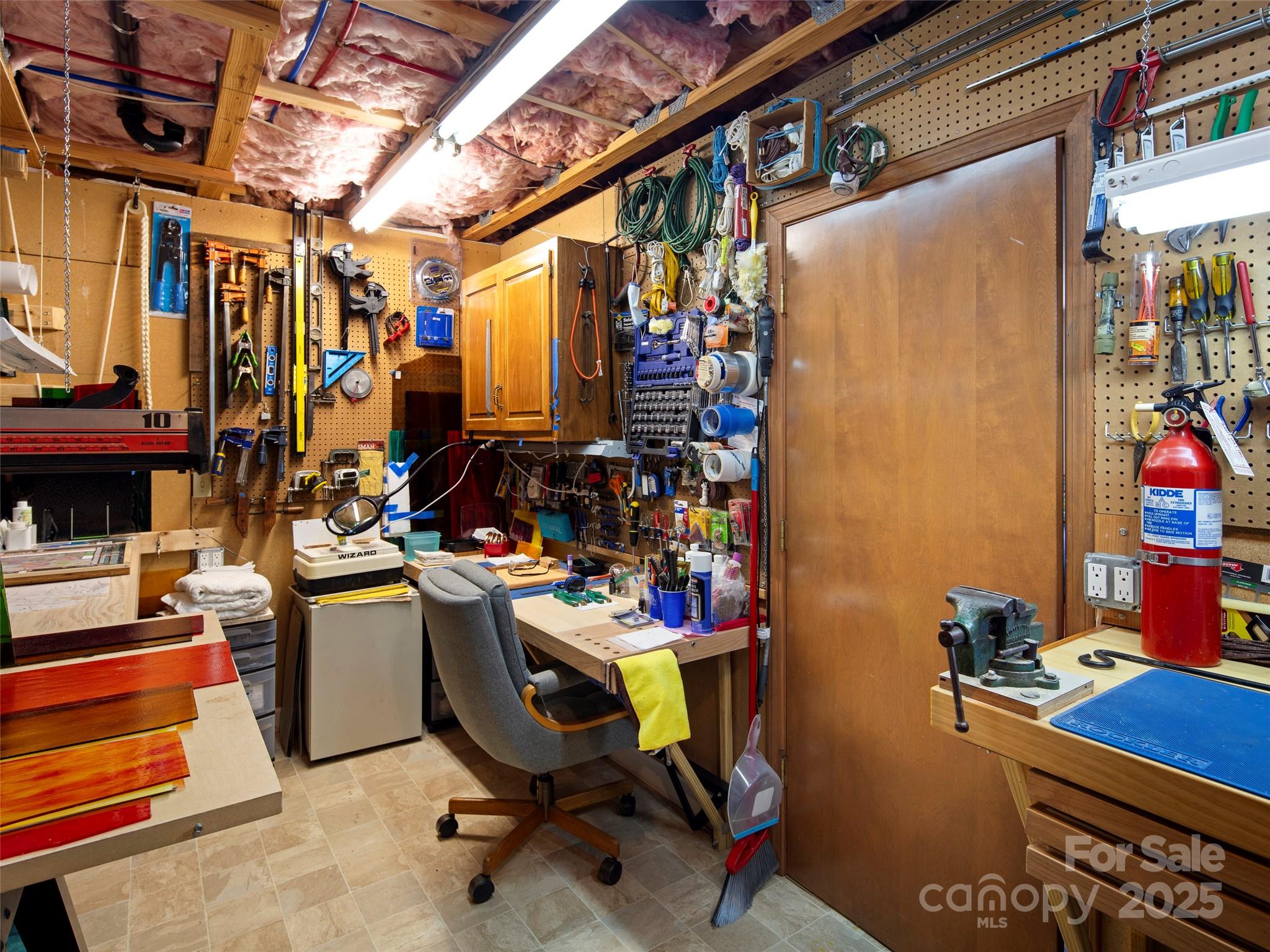 167 Country Ridge Road Laurel Park, NC 28739 - Photo 27 of 27 a view of storage and utility room