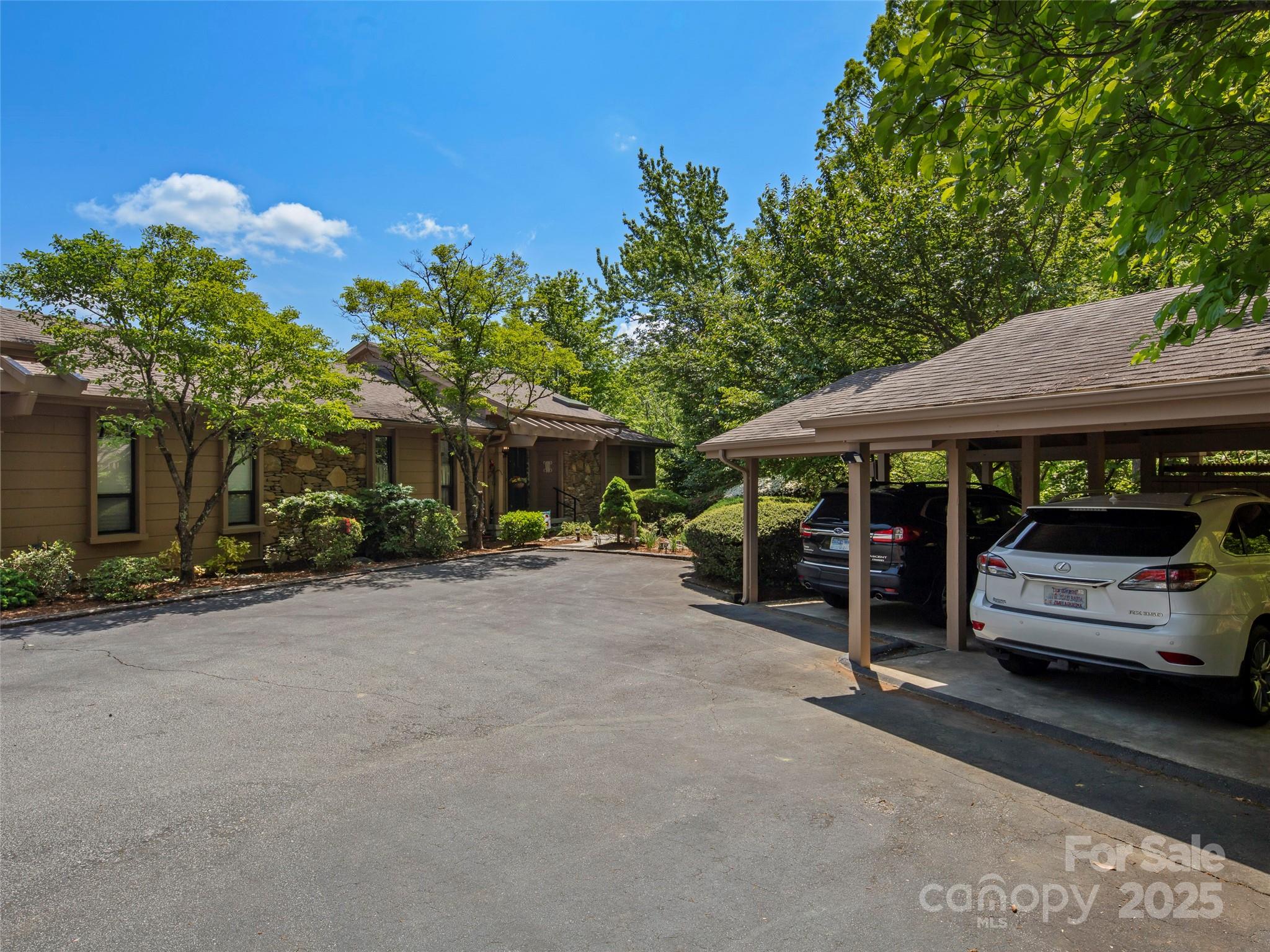 167 Country Ridge Road Laurel Park, NC 28739 - Photo 6 of 27 a view of a car park in front of house