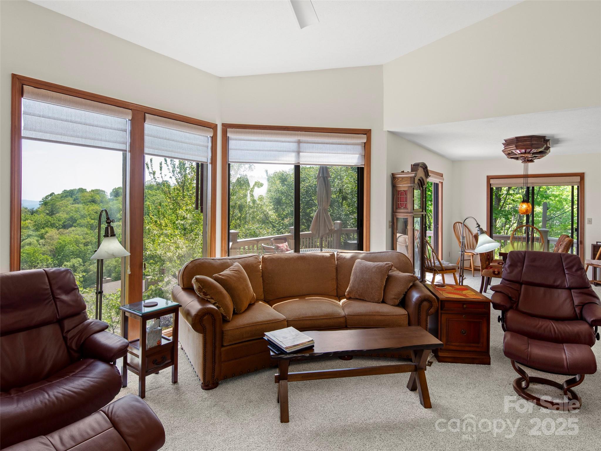 167 Country Ridge Road Laurel Park, NC 28739 - Photo 10 of 27 a living room with furniture and a large window