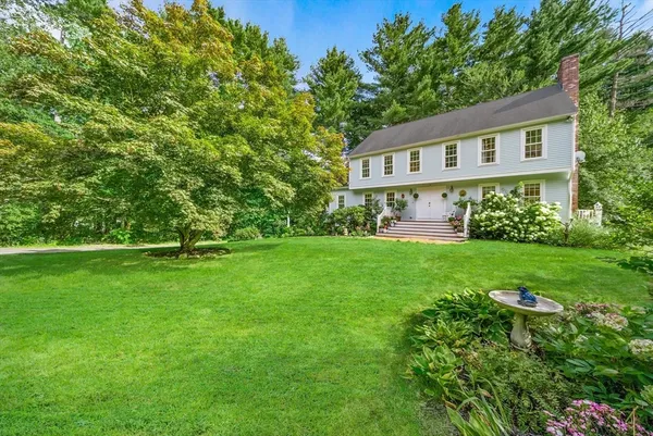 a house view with a garden space