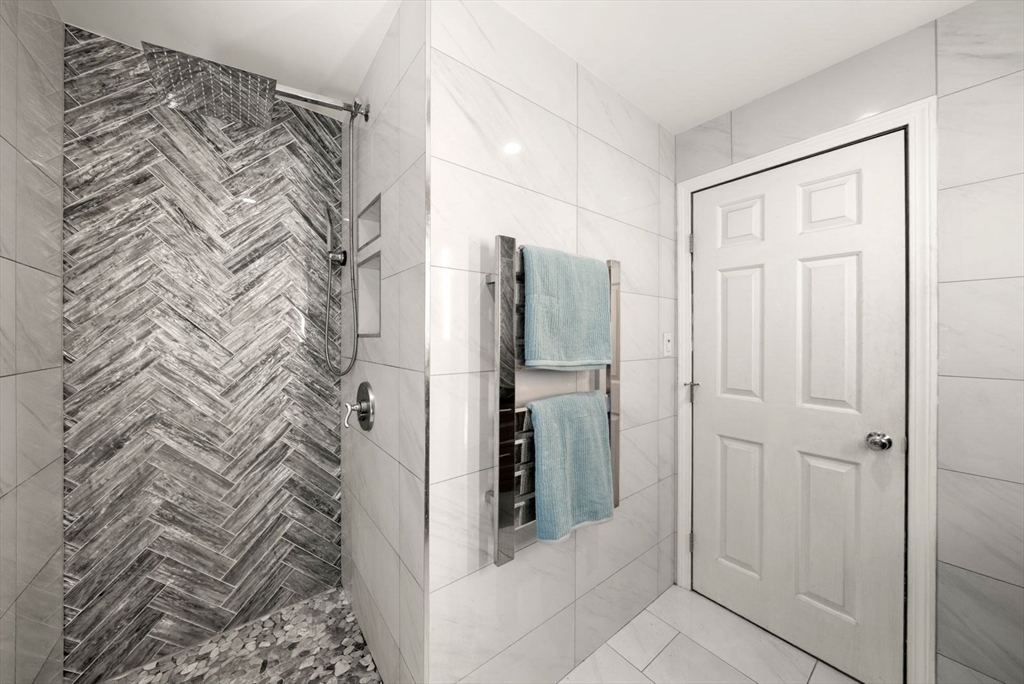 44 Gilmore Road Southborough, MA 01772 - Photo 27 of 42 a bathroom with a shower and a sink