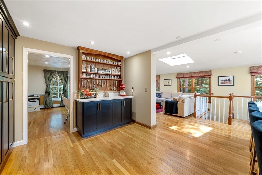 44 Gilmore Road Southborough, MA 01772 - Photo 9 of 40 a view of a living room kitchen and a wooden floor