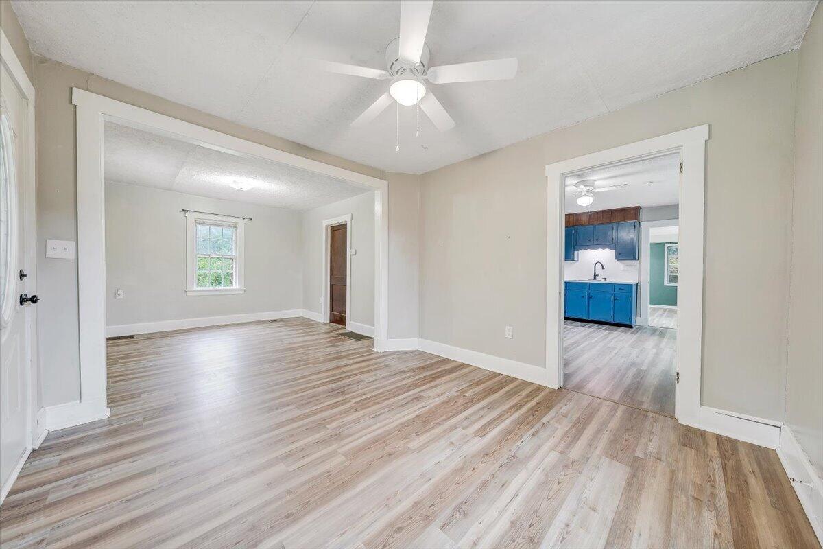 1384 Thaxton Mountain Road Thaxton, VA 24174 - Photo 11 of 44 wooden floor in an empty room with a window