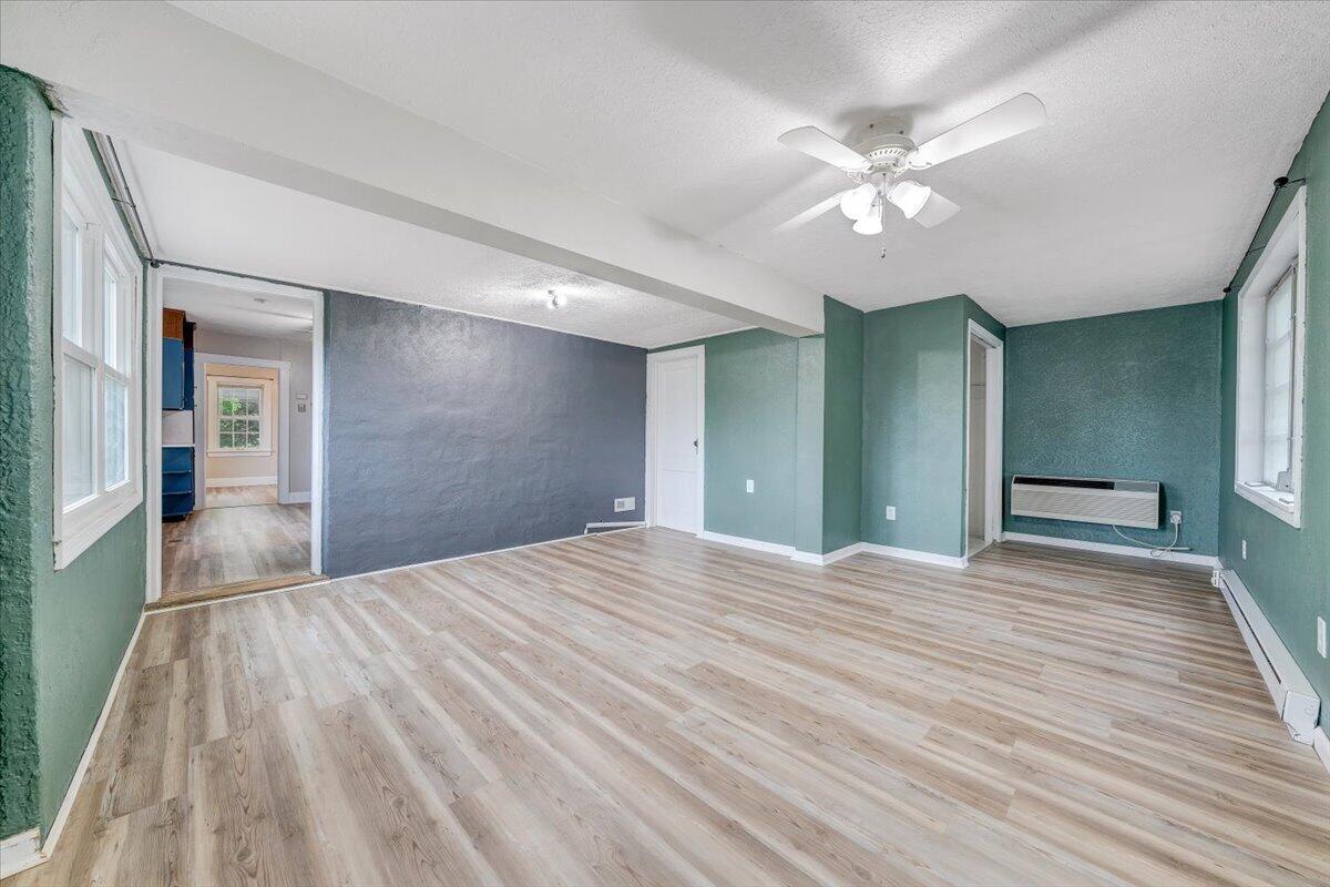 1384 Thaxton Mountain Road Thaxton, VA 24174 - Photo 18 of 44 a view of empty room with wooden floor