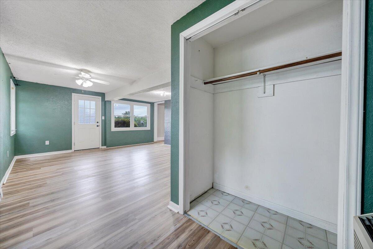 1384 Thaxton Mountain Road Thaxton, VA 24174 - Photo 20 of 44 a view of a big room with wooden floor and windows