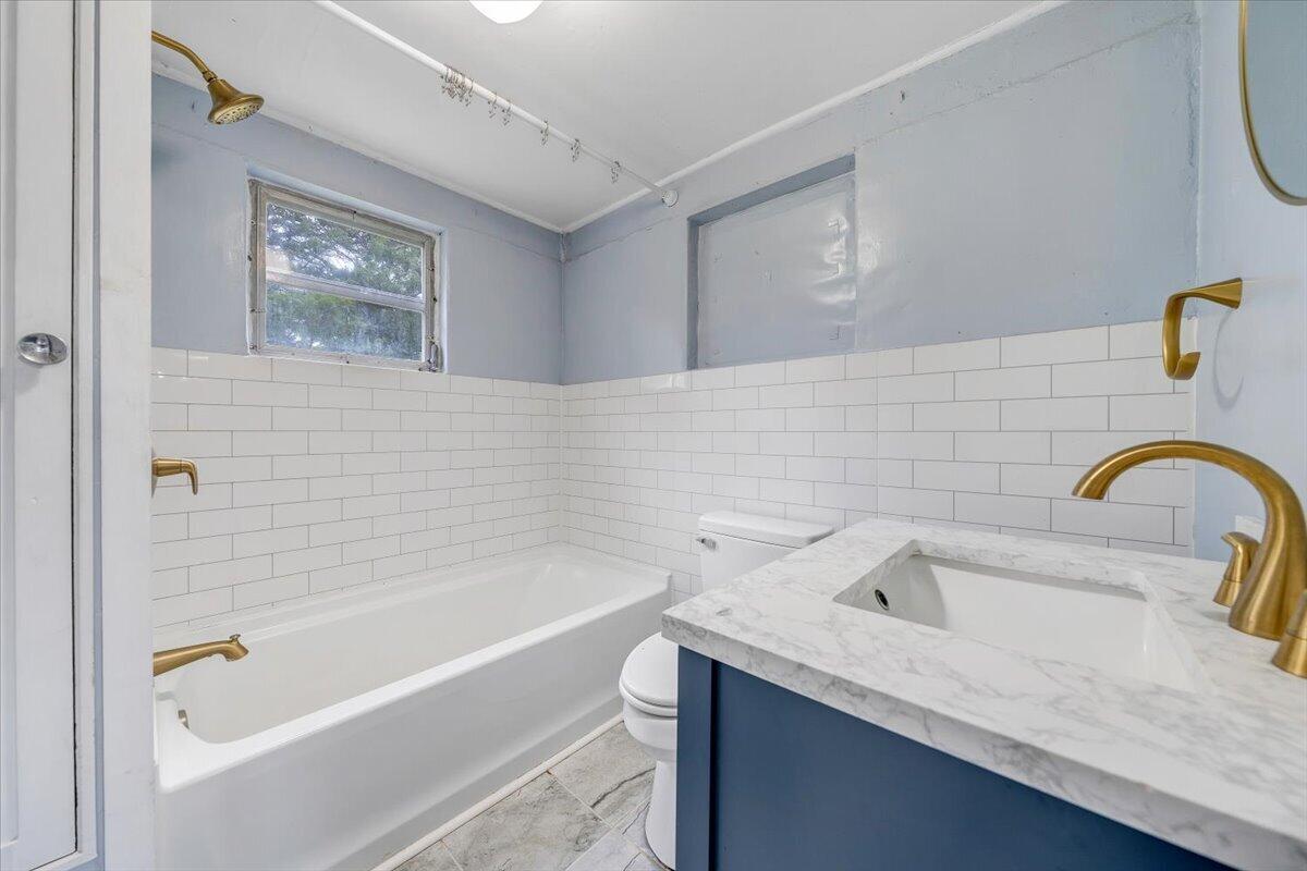 1384 Thaxton Mountain Road Thaxton, VA 24174 - Photo 24 of 44 a bathroom with a sink and a bathtub