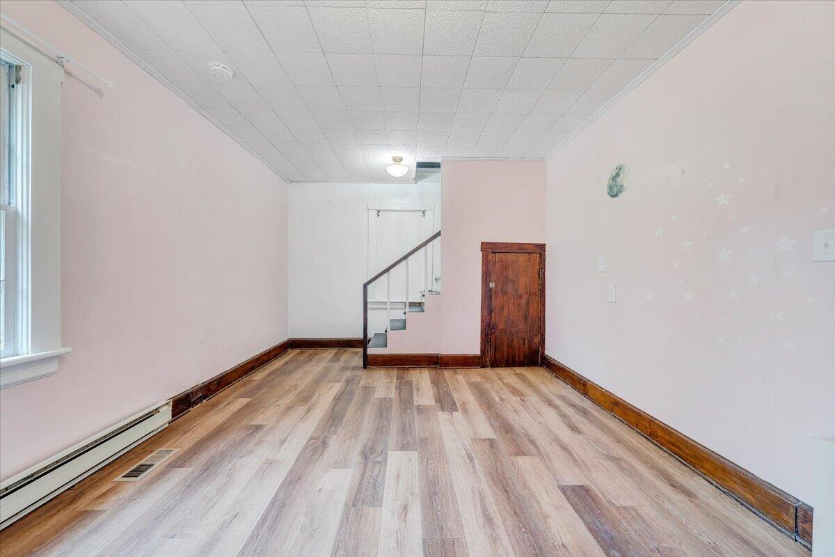 1384 Thaxton Mountain Road Thaxton, VA 24174 - Photo 25 of 44 a view of an empty room with wooden floor