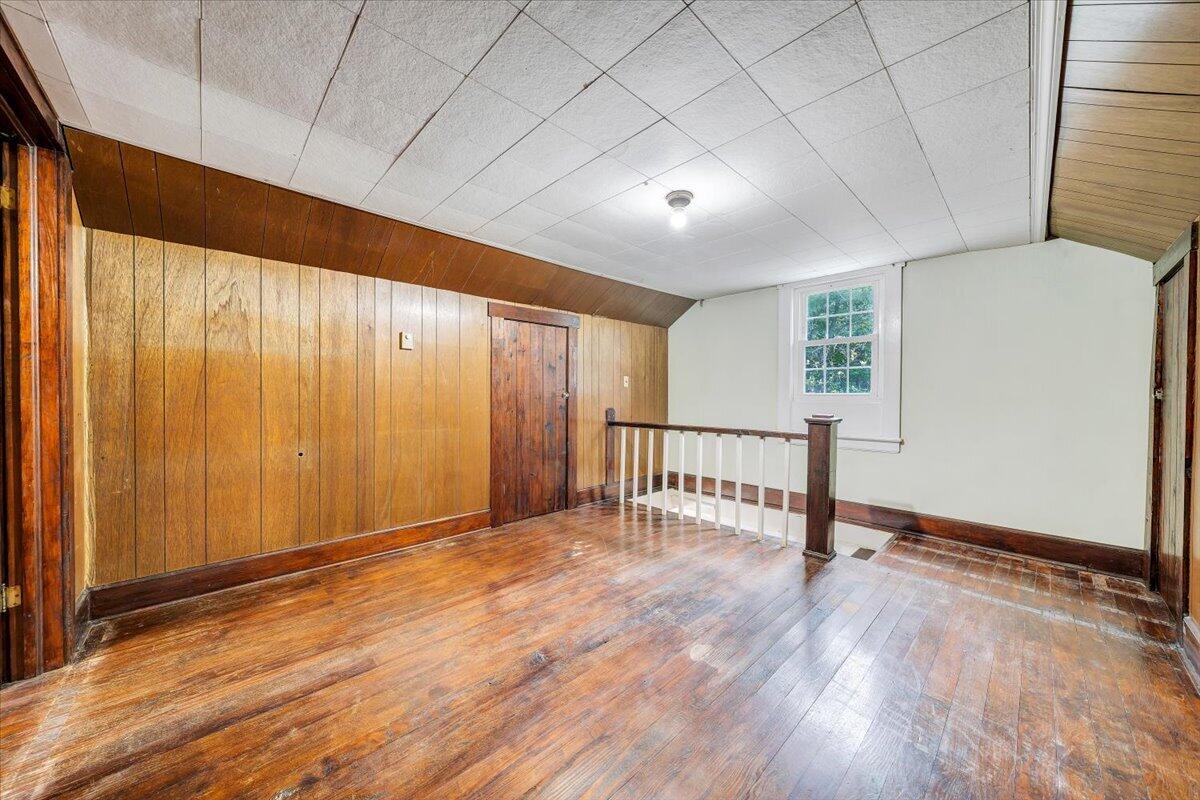 1384 Thaxton Mountain Road Thaxton, VA 24174 - Photo 29 of 44 an empty room with wooden floor and windows