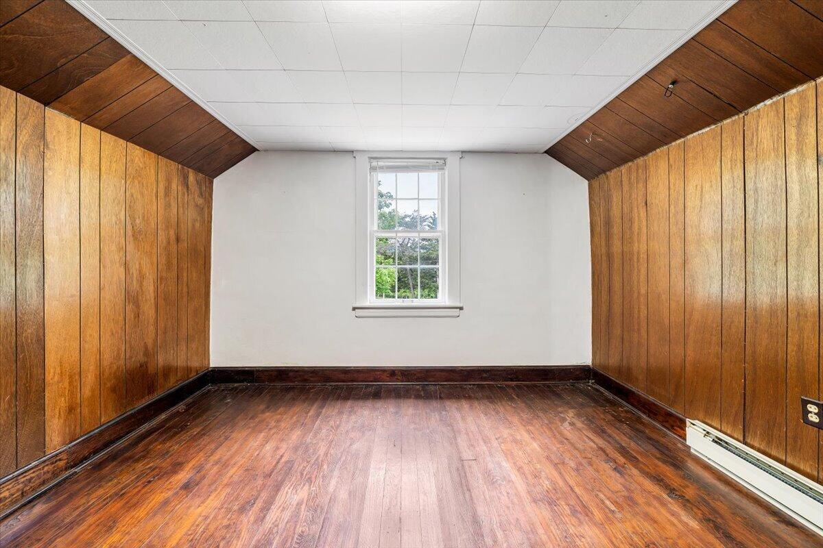 1384 Thaxton Mountain Road Thaxton, VA 24174 - Photo 32 of 44 a view of empty room with wooden floor and fan