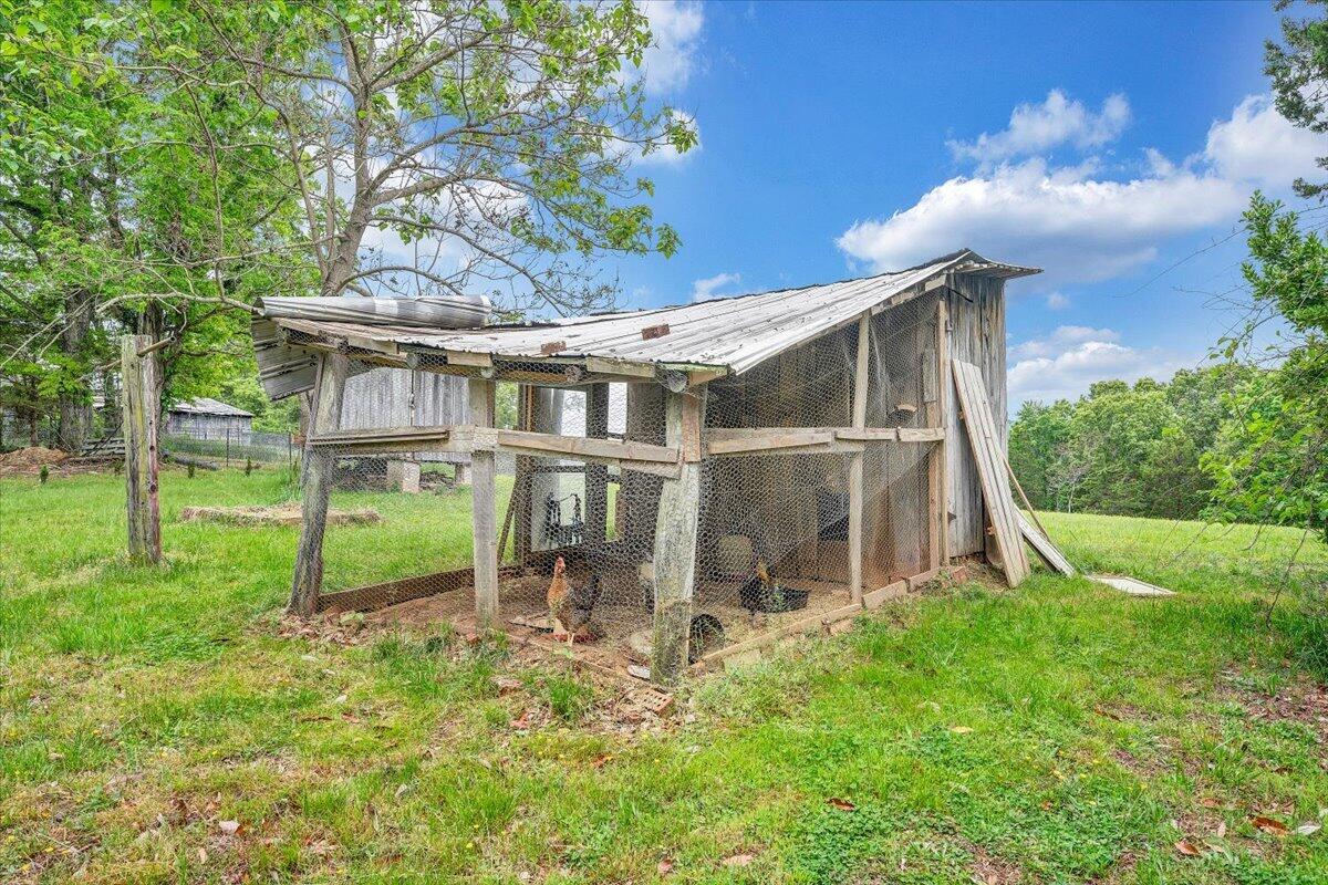 1384 Thaxton Mountain Road Thaxton, VA 24174 - Photo 38 of 44 a view of house with backyard