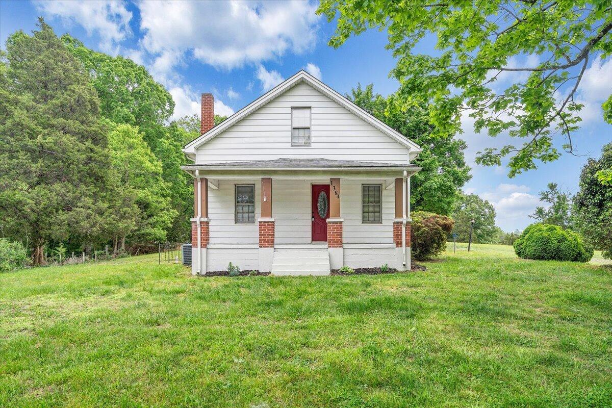 1384 Thaxton Mountain Road Thaxton, VA 24174 - Photo 41 of 44 a front view of house with yard and green space