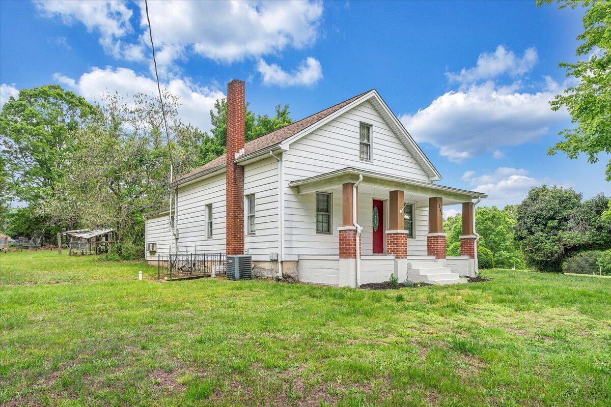 1384 Thaxton Mountain Road Thaxton, VA 24174 - Photo 2 of 44 a front view of house with yard and green space