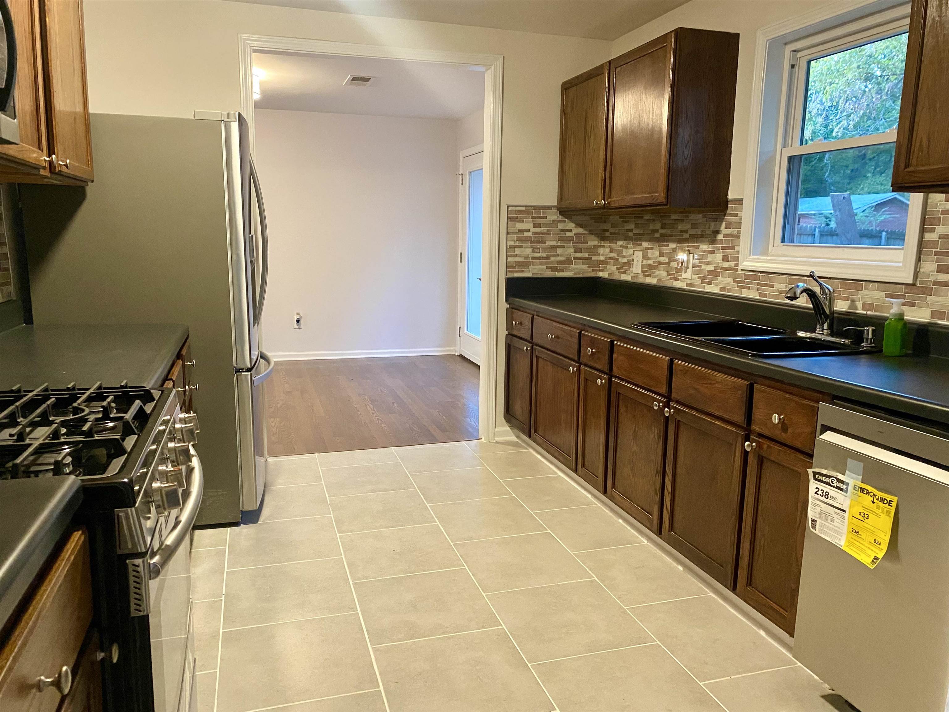 502 James Avenue Covington, TN 38019 - Photo 16 of 40 a bathroom with a sink and a mirror