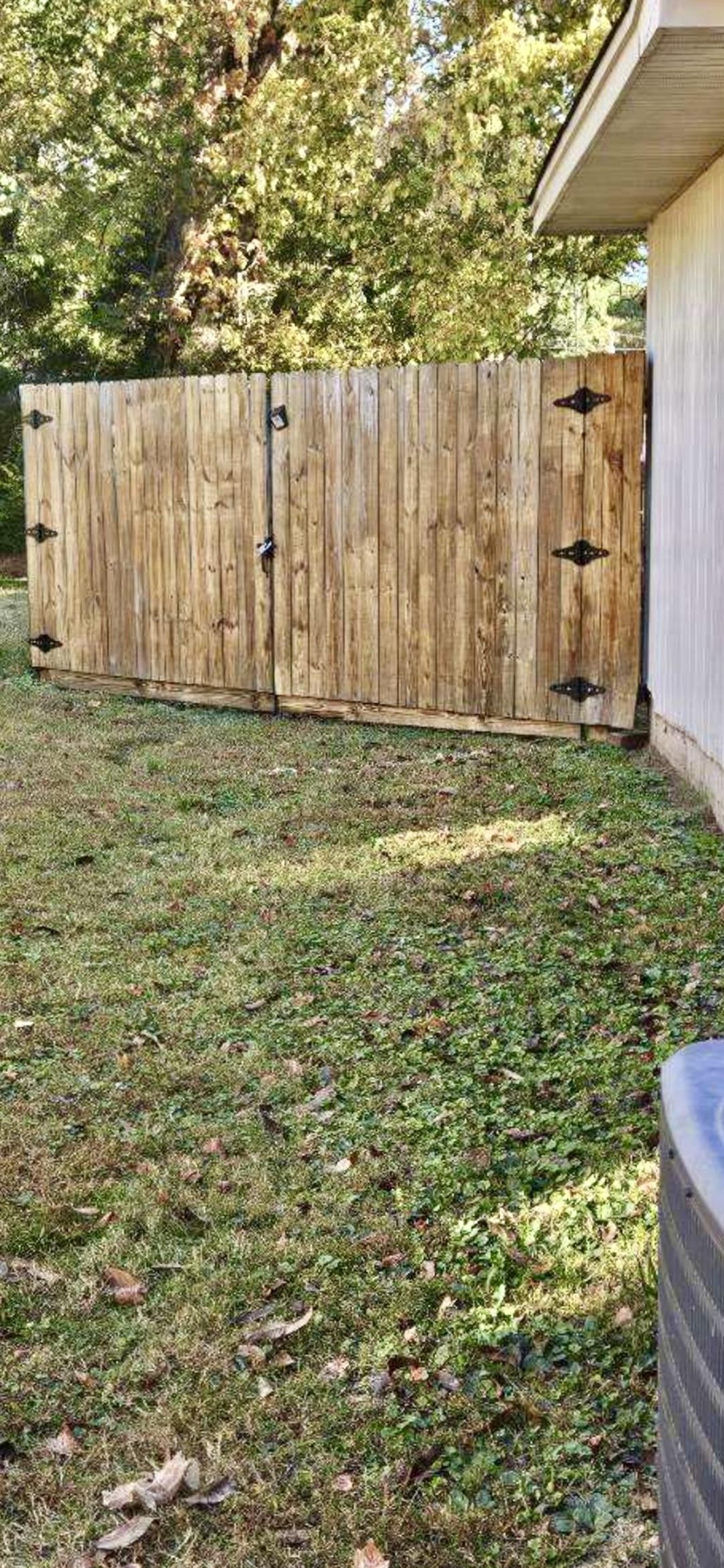 502 James Avenue Covington, TN 38019 - Photo 31 of 40 a view of a backyard with white door