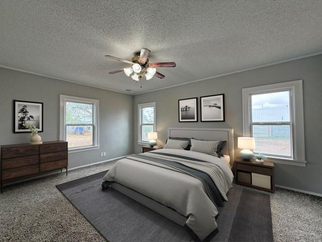 1001 North 3rd Street Lamesa, TX 79331 - Photo 24 of 32 a spacious bedroom with a bed and a window