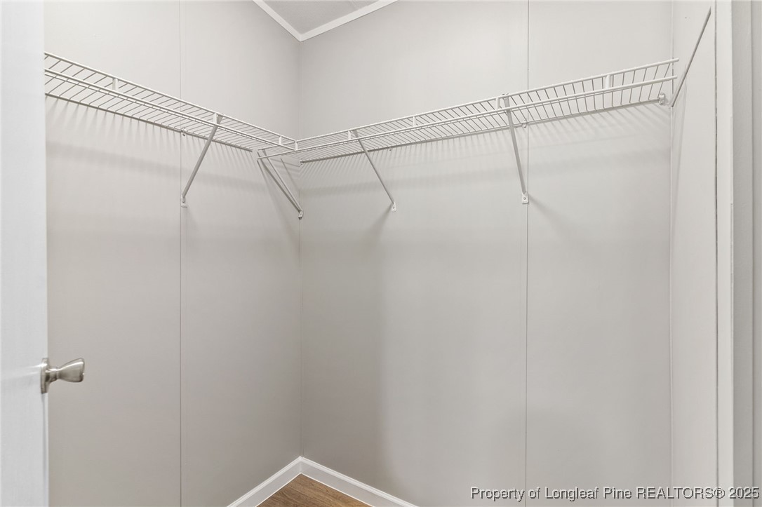 1334 East Green Springs Road Parkton, NC 28371 - Photo 14 of 32 a view of a room with racks on the wall