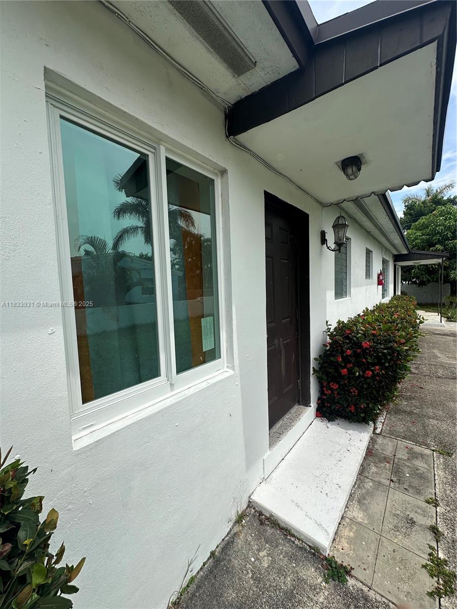 809 Northeast 2nd Street, Unit 12 Hallandale Beach, FL 33009 - Photo 17 of 19 a view of entryway