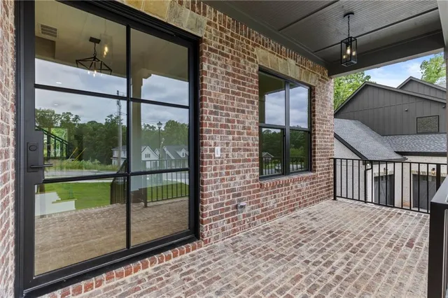 a porch with a glass door