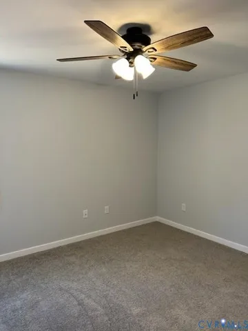 a view of a small space with a fan