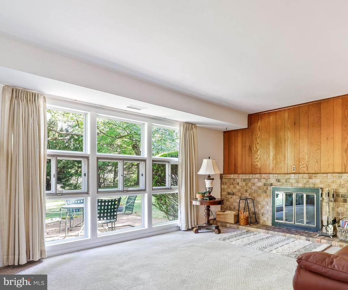 1421 Morningside Drive Silver Spring, MD 20904 - Photo 12 of 37 Family Rm wall of windows, wood burning fireplace
