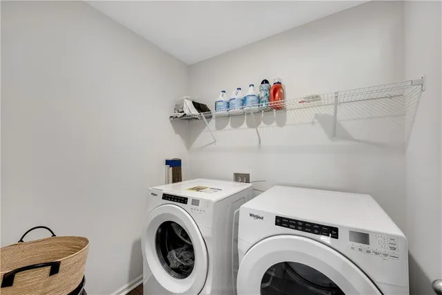 a view of storage and utility room with racks on the wall