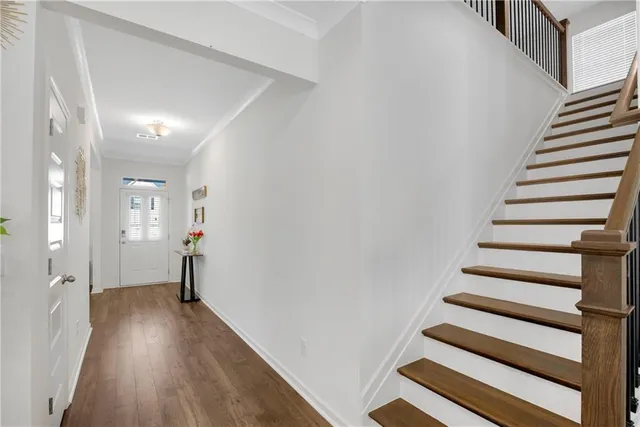 a view of entryway with wooden floor