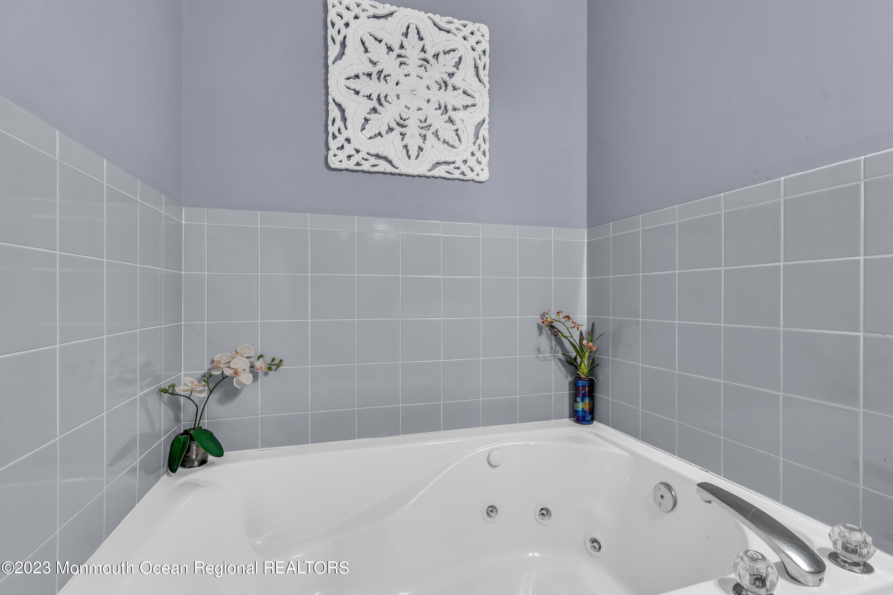 239 Beach Front, Unit 1 Manasquan, NJ 08736 - Photo 19 of 31 a bathroom with a bathtub
