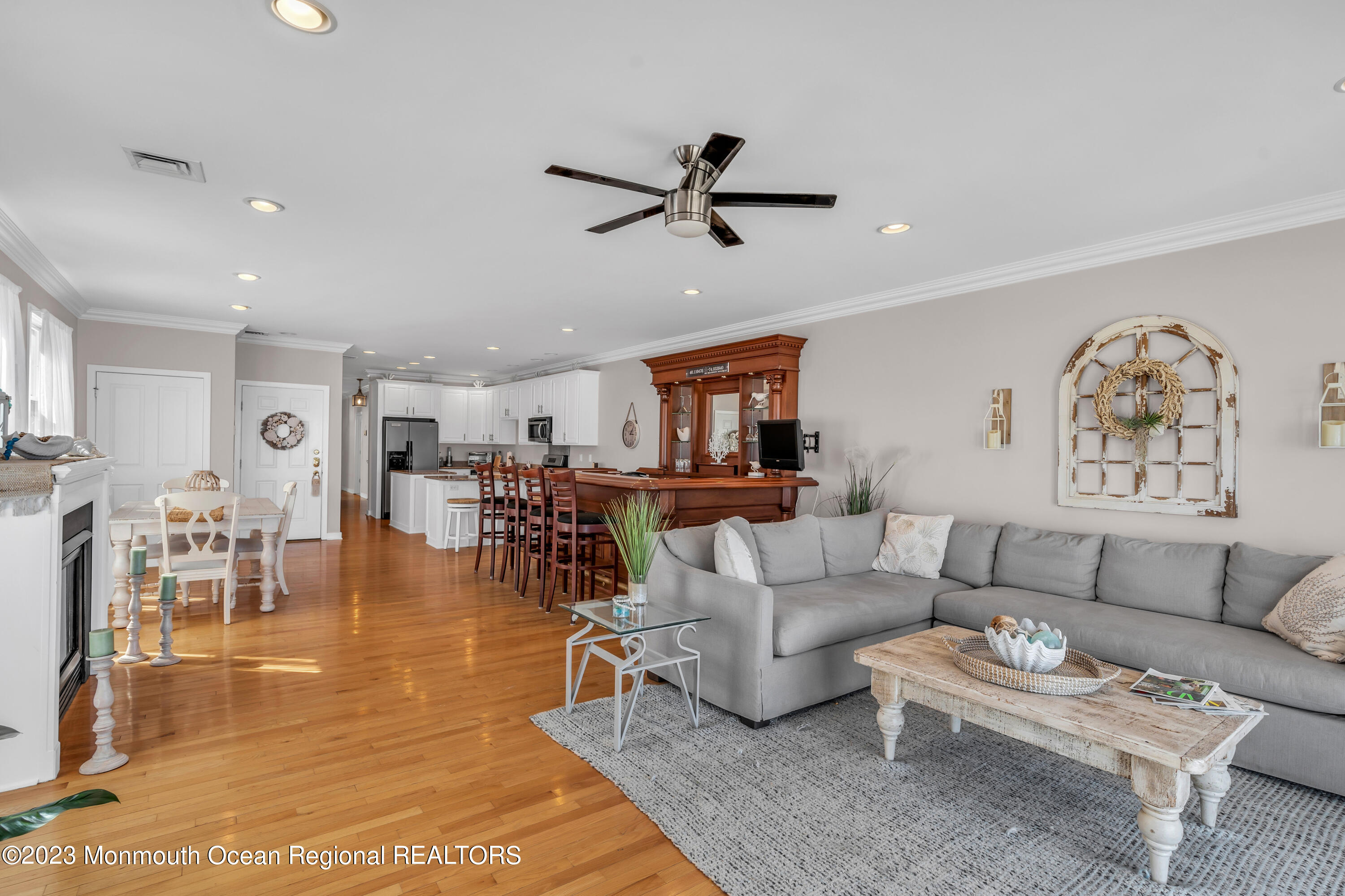 239 Beach Front, Unit 1 Manasquan, NJ 08736 - Photo 9 of 31 a living room with furniture and a view of kitchen