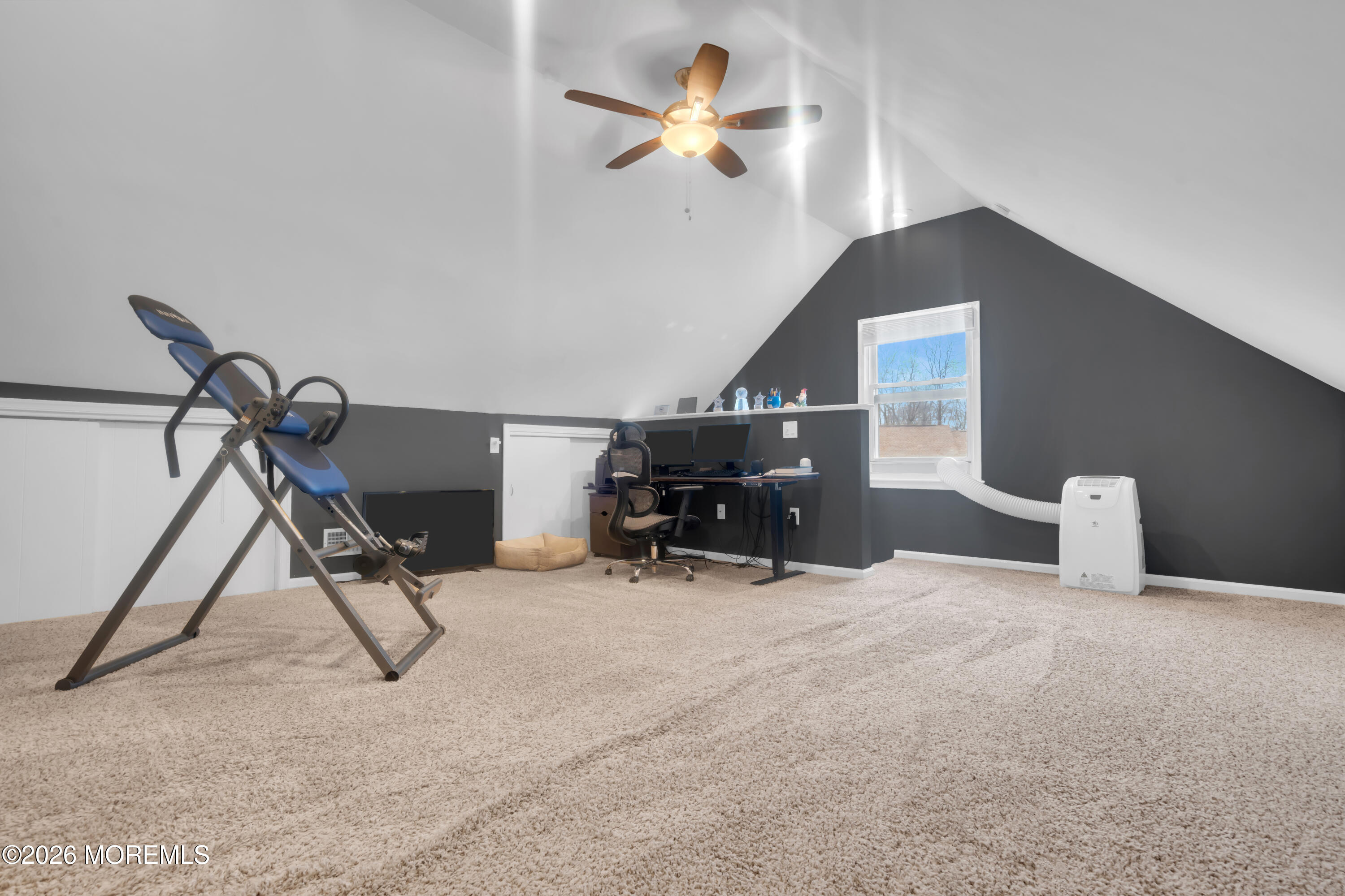 30 Shilling Way Jackson, NJ 08527 - Photo 27 of 28 a view of a room with gym equipment and a chandelier