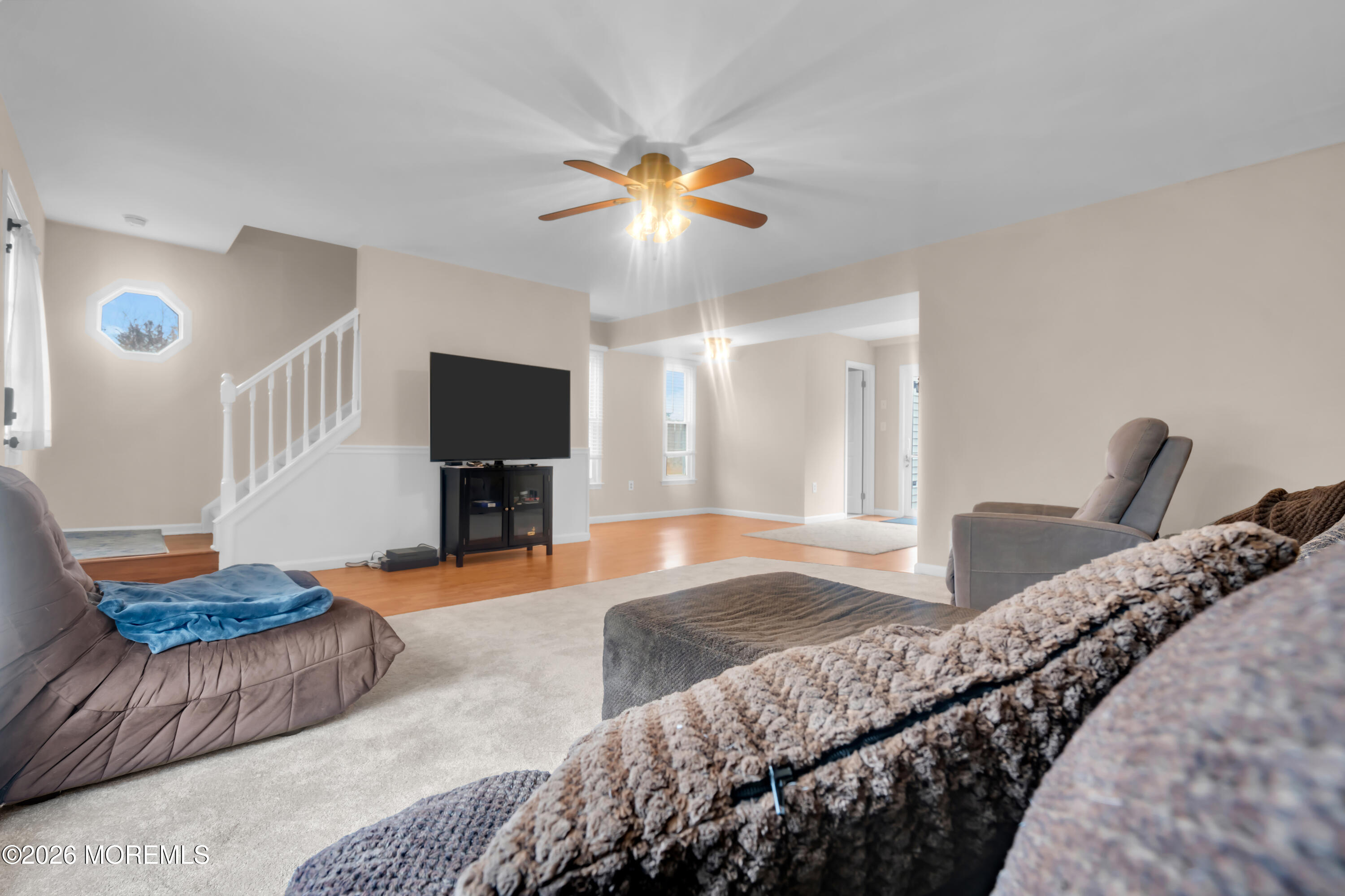 30 Shilling Way Jackson, NJ 08527 - Photo 4 of 28 a bedroom with a bed and a chandelier