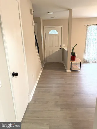 a view of a hallway view with staircase