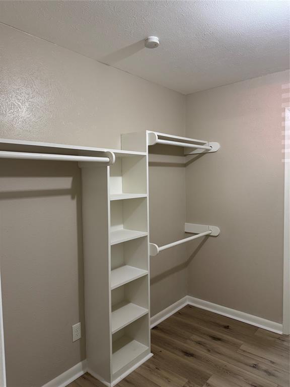 711 Farmington Road Howe, TX 75459 - Photo 12 of 21 a view of an empty walk in closet