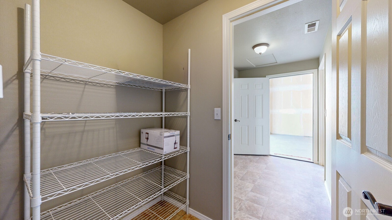 321 Kent Way Eltopia, WA 99330 - Photo 18 of 35 a room with storage and utility