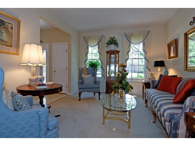 3530 Monarch Circle Naperville, IL 60564 - Photo 3 of 19 a living room with furniture and a table