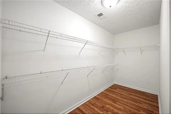a view of a room with racks on the wall