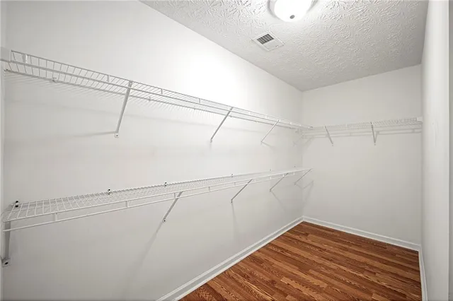 a view of a room with racks on the wall