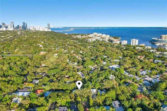 a view of a large body of water with a building in the background