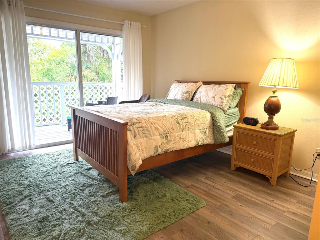 1340 Cypress Cove Court Inverness, FL 34450 - Photo 16 of 30 a bedroom with a bed and window