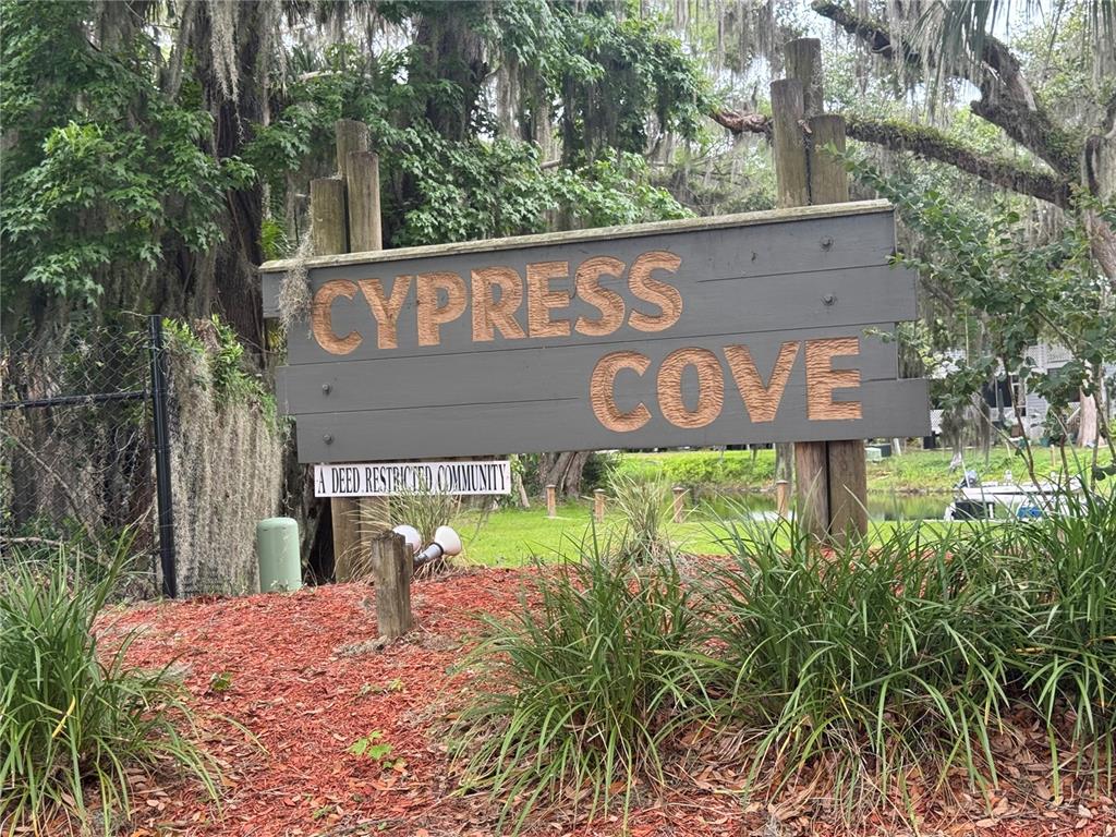 1340 Cypress Cove Court Inverness, FL 34450 - Photo 30 of 30 a sign that is on a brick wall