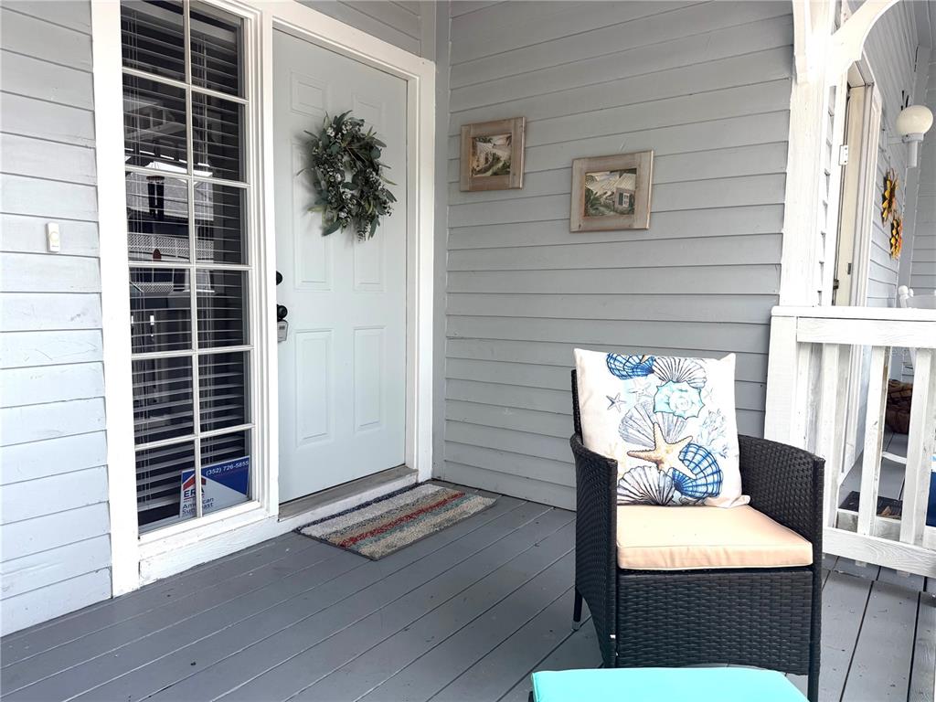 1340 Cypress Cove Court Inverness, FL 34450 - Photo 3 of 30 a view of front door and porch with wooden floor