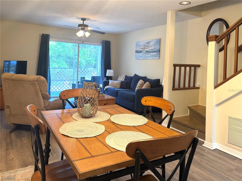 1340 Cypress Cove Court Inverness, FL 34450 - Photo 6 of 30 a view of a dining room with furniture window and wooden floor