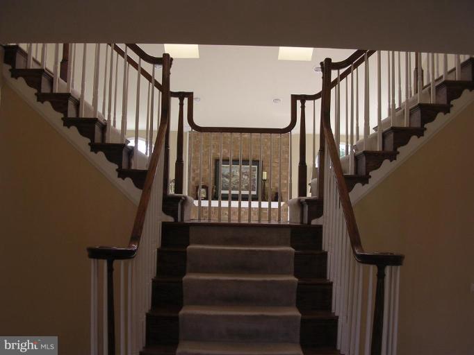1354 Atwood Road Silver Spring, MD 20906 - Photo 11 of 21 TILE FOYER WITH UNIQUE "Y" STAIRCASE TO UPSTAIRS