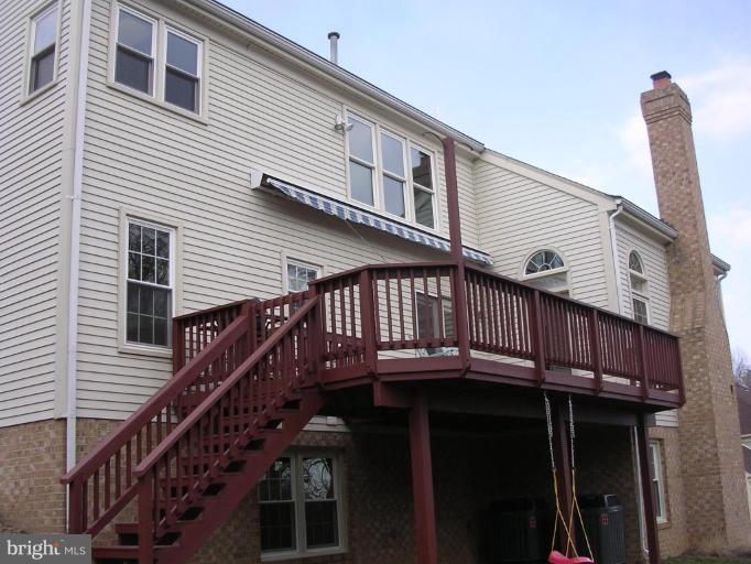 1354 Atwood Road Silver Spring, MD 20906 - Photo 17 of 21 LARGE DECK WITH VIEWS OF MAJESTIC PINE TREES