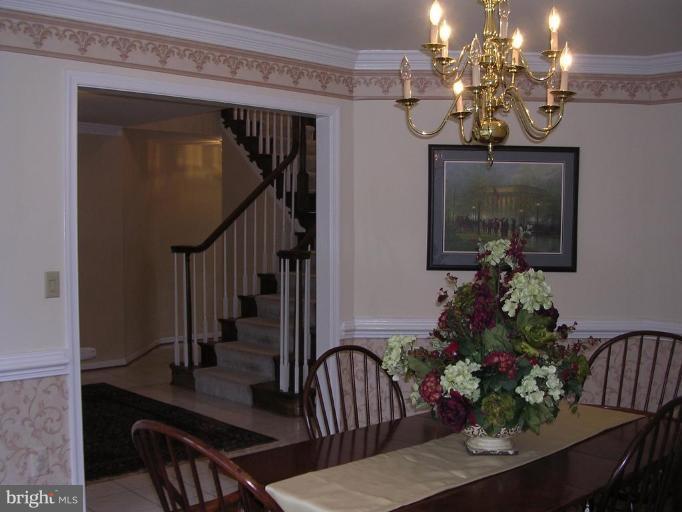 1354 Atwood Road Silver Spring, MD 20906 - Photo 6 of 21 LARGE DR W/HW FLOORS, CHAIR & CROWN MOULDINGS