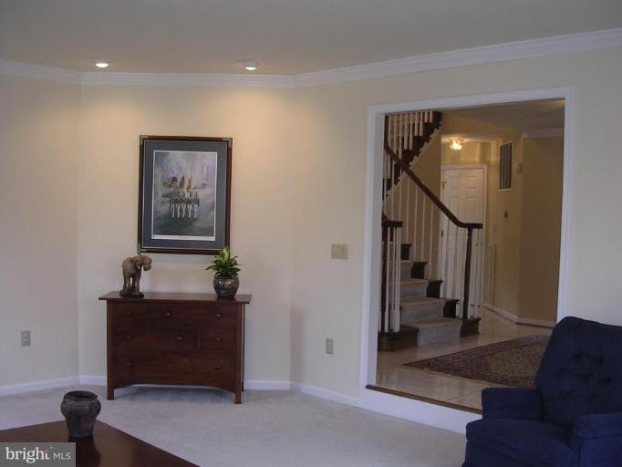 1354 Atwood Road Silver Spring, MD 20906 - Photo 9 of 21 VIEW OF TILE FOYER AND STAIRCASE FROM LR