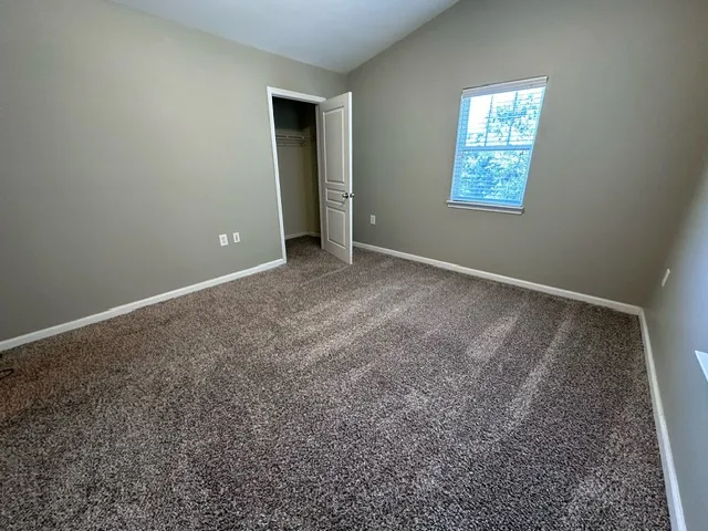 a bathroom with a toilet a sink and a bathtub